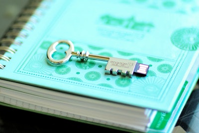 The Engage!13 luxury-wedding business summit in June gave out custom journals with vintage key-shaped USBs containing the full attendee contact list and the partner listing. Wedding strategy consulting firm Engaging Concepts planned the June event at the Inn on Biltmore Estate in Asheville, North Carolina.