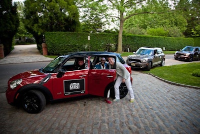 At the Hetrick-Martin Institute's School's Out event, Greater Gotham Mini Dealers provided a fleet of the teensy-tiny cars to shuttle guests from a nearby beach lot to a major spread on Gin Lane. While leaving your car for a shuttle system is always tricky (indeed, one major fashion editor simply refused), the system worked perfectly. The wait was only a minute or so on each end.