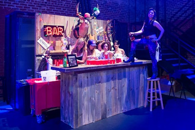 A station inspired by the 2000 film Coyote Ugly—which had female bartenders dancing on the bar—served drinks made with Salerno, a blood-orange liqueur, and Miller High Life.