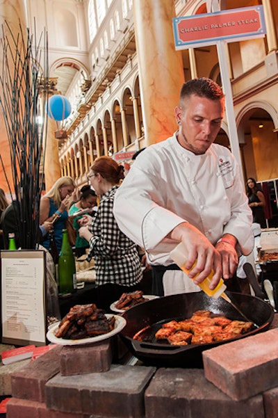 The main floor hosted 73 local restaurants, including Charlie Palmer Steak, with many of the chefs preparing the food at their tables.