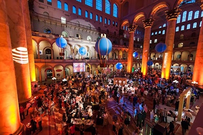 Chicka suspended eight decorative hot-air balloons from the ceiling above the 2,000-person event.