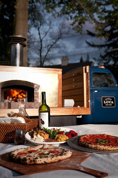 Take advantage of still-warm weather with an outdoor bash catered by Pizza Luca. The mobile pizza company added a second wood-burning-oven-equipped 1952 Chevy flatbed truck to its fleet in July. It features mahogany and marble trim; windows that hinge on hydraulic pistons for the support of canopies; and a full-service kitchen with a refrigerated prep table, freezer, sink, and dough mixer. Available for events in the tristate area, the simple menu of authentic Neapolitan pies is made using all-natural, non-processed ingredients such as San Marzano tomatoes, garlic, mozzarella di bufala, basil, and Sicilian sea salt. Catering starts from $995 for a two-hour event.