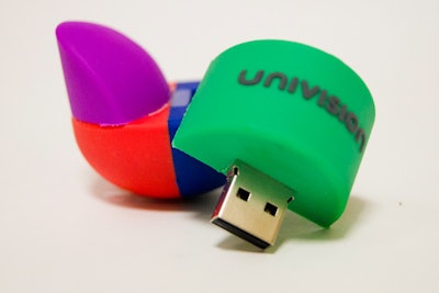 Univision turned its corporate logo into a USB drive that was given to journalists covering the TV network's 2013 upfront presentation. The colorful takeaway included press releases, photos of executives, and ratings information.