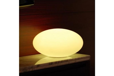 Oval ball LED lighting for warm living room decor.