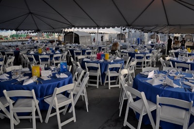 A dinner event under tenting with the guns in the background. Photo: Derek Cross