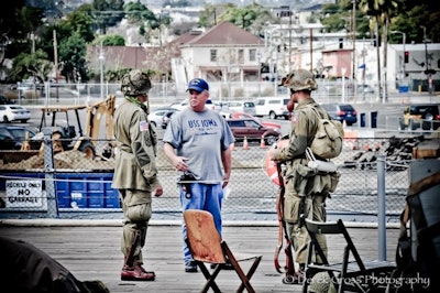 Reenactor teaching a new lesson. Photo: Derek Cross