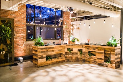 A rustic, three-piece pallet bar is one of the new rentals available for fall 2013 from Amaryllis. The overall footprint of the U-shaped bar is about 15 feet long and 6 feet deep, and open crevices on the façade can hold floral arrangements.