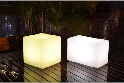 LED chairs used as outdoor decoration on a beach or poolside deck.