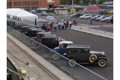 Looking down to the pier at a car display