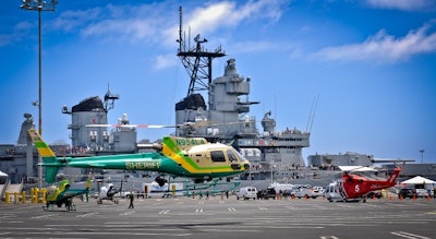 Pierside parking lot with a helicopter demonstration. Photo: Derek Cross
