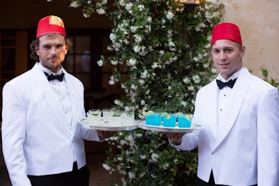 Valet attendants and waiters wore fez hats to advance the theme.