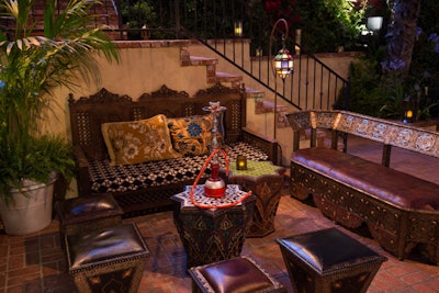 To celebrate a 70th birthday, a couple chose a Casablanca theme in an homage to their favorite movie. JOWY Productions designed and produced a party at the family’s Los Angeles home that recalled a stylized ‘40s supper club. JOWY turned the front yard into a Moroccan lounge decorated with seating groups, pillows, tables, glass lamps, and hookah pipes evocative of the North African locale.