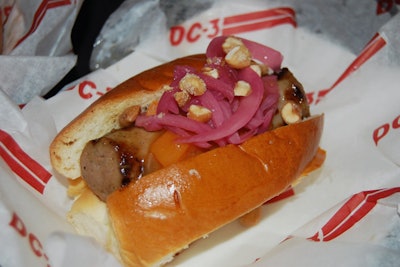 DC-3 and Matchbox's Anthony Piscioneri used Ommegang's Rare Vos beer in his foie dog with apricot chutney topped with pickled onions and house-made beer nuts on bread infused with the brew.