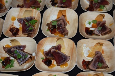 Kamal Chanaka from Smith Commons served sous vide moulard duck breast on a taleggio-stuffed pearl barley patty topped with a rutabaga and orange puree and spiced cashew relish. Chanaka created a powder from Ommegang's Hennepin beer as the final element on each dish.