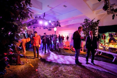 A parklike scene with swings, croquet, trees, benches, lampposts, and grass formed the casual vignette at a New York gallery for Google's November 2010 launch of Boutiques.com.