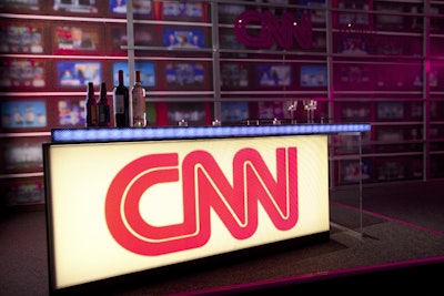 Our mock news desk doubles as a bar.