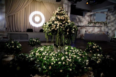 Target remodeled a New York gallery space into a Parisian street scene for the press preview of its Jason Wu collection in January 2012. At the center of the space was the town square, which included an enormous, fountain-like floral arrangement. Elsewhere, black-and-white decals, lampposts, and trees added to the outdoor look.