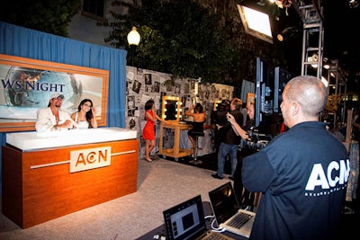 Guests tried their luck at newscaster karaoke on a specially built news desk set.