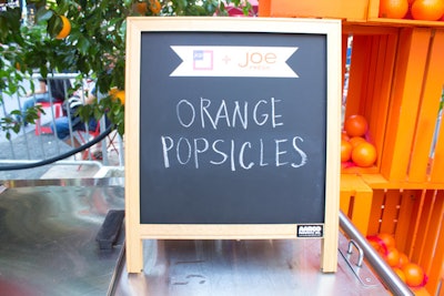In addition to glasses of juice, staff at the orange grove handed out free branded orange popsicles.