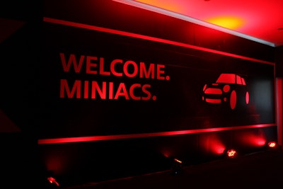 The registration area, dedicated event elevator, and other spaces had signage developed for the launch, all in nightclub-esque black and red.