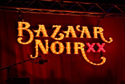 The stage included the event name in marquee lights.