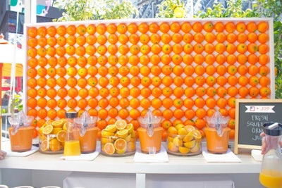 One of the most striking visuals was a wall of oranges that served as the backdrop to the bar where staff poured complimentary cups of freshly squeezed orange juice.