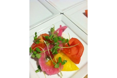 Heirloom tomatoes, pickled red onions, and micro opal basil