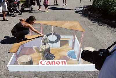 Toronto-based street painter David Johnston uses chalk to make realistic trompe l’oeil images at live events for brands such as 20th Century Fox, Canon, and Loblaws. He creates the seemingly 3-D scenes and objects on flat surfaces such as cement or canvas. Johnston is available for travel throughout the United States and Canada; pricing is available on request.