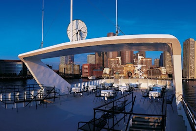 The Odyssey, an Entertainment Cruises vessel, recently underwent extensive renovations and teamed up with Chopped star Eric Levine to offer new interactive food stations. Selections include salad-martini stations, risotto stations, and a station with assorted cakes and sweet dipping sauces. The Admiral's Lounge can host board meetings and private events for 55 guests, while two climate-controlled dining decks (pictured) can host receptions for 200. The entire boat can host functions for as many as 500 guests.