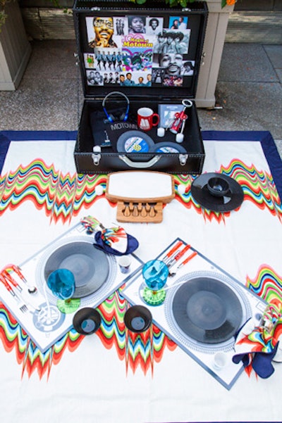 Michigan-based interior designer Corey Damen Jenkins opted for a Motown theme, featuring a suitcase decorated with photos of music legends and a trippy-looking neon-colored blanket.