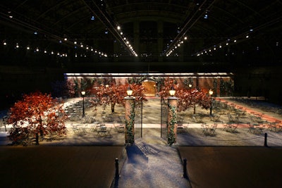 During Fashion Week in New York in February 2012, Tommy Hilfiger fashioned an elaborate set that resembled a gated garden. The showing of the designer's men’s and women's collections at the Park Avenue Armory saw attendees seated at café tables, chairs, and benches, and a brick runway bordered with gravel and artificial maple trees.