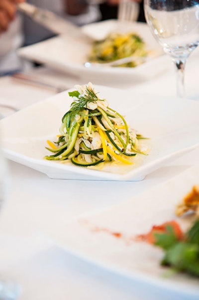 Carla Hall, former Top Chef contestant and host of ABC's The Chew, made crab salad with dill, cayenne pepper, and feta to start off the competition.