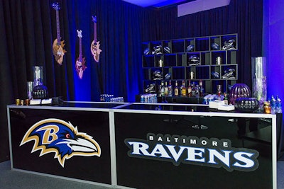 The Ravens logo decorated the front of the bar while helmets and branded footballs added detail to the back wall.