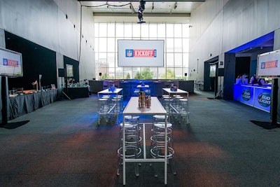 PEDG and Production Glue set up a larger projection screen and four televisions on the east side of second floor for V.I.P. guests who chose to stick around after the concert to watch the game, which was played in Denver. The space had two nearby bars and food stations serving mac 'n' cheese, pulled pork tacos, Maryland crab cakes, New York strip steak, and three kinds of sausage hot dogs.