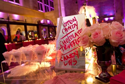 At the after-party, Great Performances decorated the dessert table to look like a boudoir. The menu was written on mirrors in red lipstick, jewelry boxes and glass jars overflowed with candy, and Lucite displays held cones of pink cotton candy.