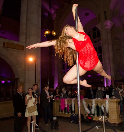 The post-show party's entertainment, inspired by Smith's tawdry strip-club beginnings, included a performance from 'pole acrobat' Rian Schaible of Phoenix Entertainment NYC.