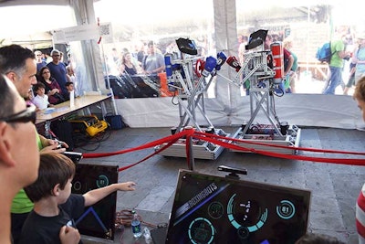One tent held a boxing match with remote-controlled robots.