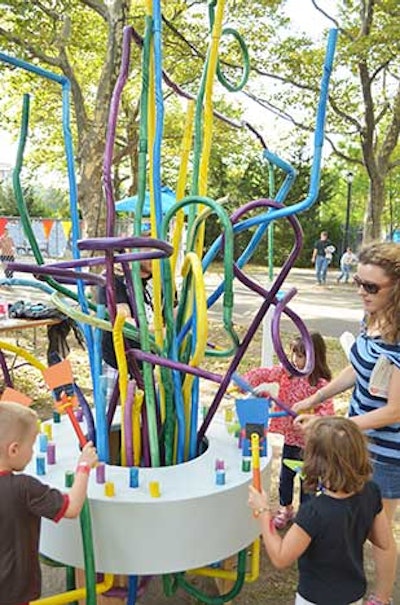 An interactive installation let people slap the ends of tubes cut to different lengths to make different musical notes.