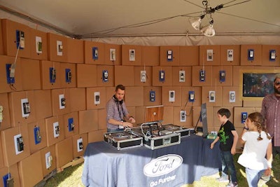 A Ford activation tent gave away speakers made from refurbished walkie-talkies.