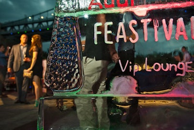 An ice sculpture with the Feastival logo designated the V.I.P. section.
