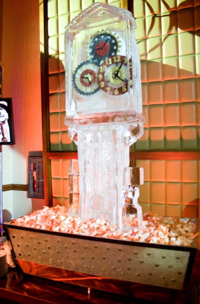 The planning team worked closely with the hotel’s chefs to design a menu that would reflect the steampunk theme. Case in point: An ice sculpture in the shape of clock tower loomed over the shrimp cocktail display. In addition to buffet-style platters of artisanal cheese, antipasti, and fruit, the spread also included gear-shaped puff pastry shells filled with mushroom ragout, rabbit stew, and lobster thermidor.