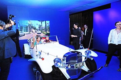 A vintage car served as a prop in a video booth. Through the use of their personalized R.F.I.D. tokens, guests could retrieve videos on a special microsite after the event.