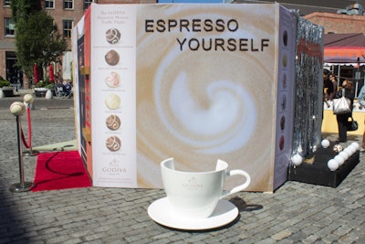 Passersby were invited to sit in a teacup for the 'Espresso Yourself' backdrop tied to the café au lait mousse truffle.