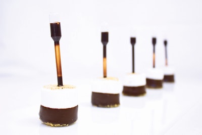Chocolate-dipped toasted marshmallows with graham cracker dust and chocolate-filled pipettes, by Elegant Affairs Off-Premise Catering & Event Design in New York