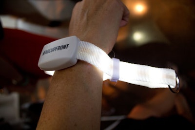 Light-up wristbands from Xylobands, marked with a hashtag, were incorporated into the event.