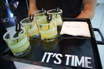 The campaign tagline was incorporated through various aspects of the event design, including drink stirrers and catering trays.