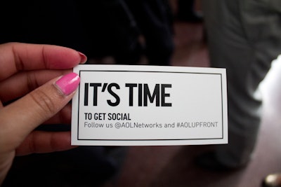 A low-tech method—paper cards—reminded guests to connect with the media company on social media.