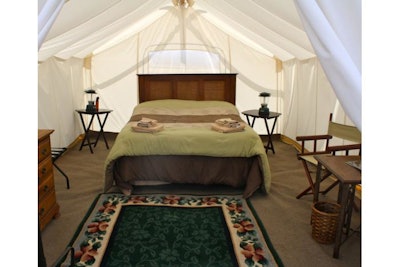 Safari tents sleep as many as four with extra cots available.
