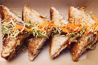 The Bombay Sandwich Company in New York can bring its healthy Indian sandwiches to meetings for a $300 minimum. Fragrant spices and vegan ingredients—such as quinoa, roasted eggplant, and sweet potato—are stuffed between two slices of bread spread with fruit chutney. The sandwiches are then toasted, sealed in a cast-iron press, and topped with carrot, cilantro, and crunchy chickpea flakes. The company’s made-to-order stations are popular for events; gluten-free platters of sandwich stuffings sans bread are available. Meals cost around $12 per person.