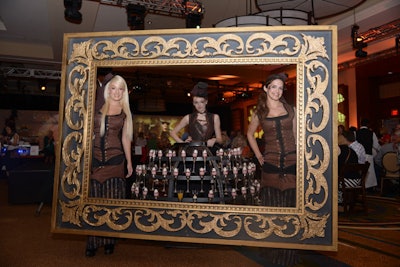 Two staffers dressed in steampunk costumes carrying an oversize (but lightweight) gilded frame wandered the reception room, encouraging guests to pose for photos while framed inside. A stationary green-screen photo booth was also set up in the foyer, along with steampunk accessories such as goggles, hats, and parasols.